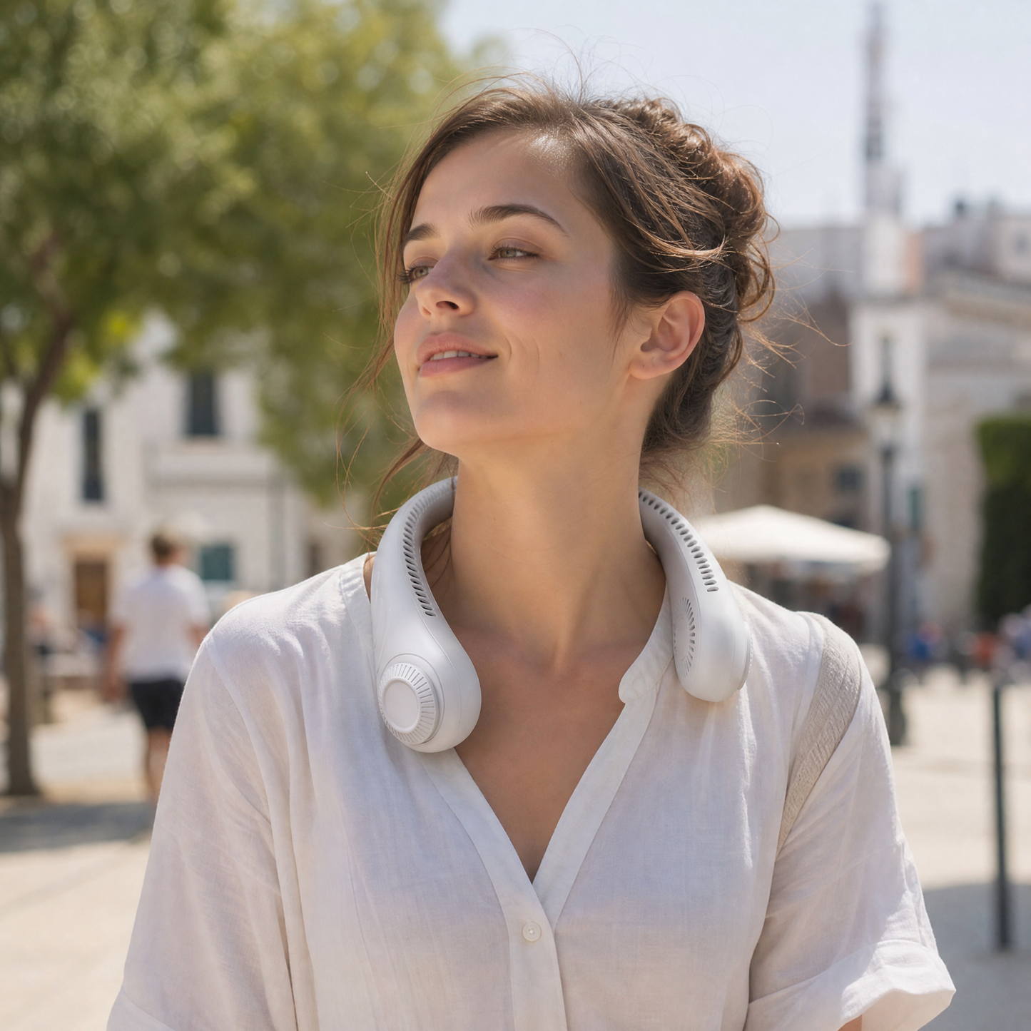 CircuitTech NeckBreeze worn outdoors on a sunny summer day